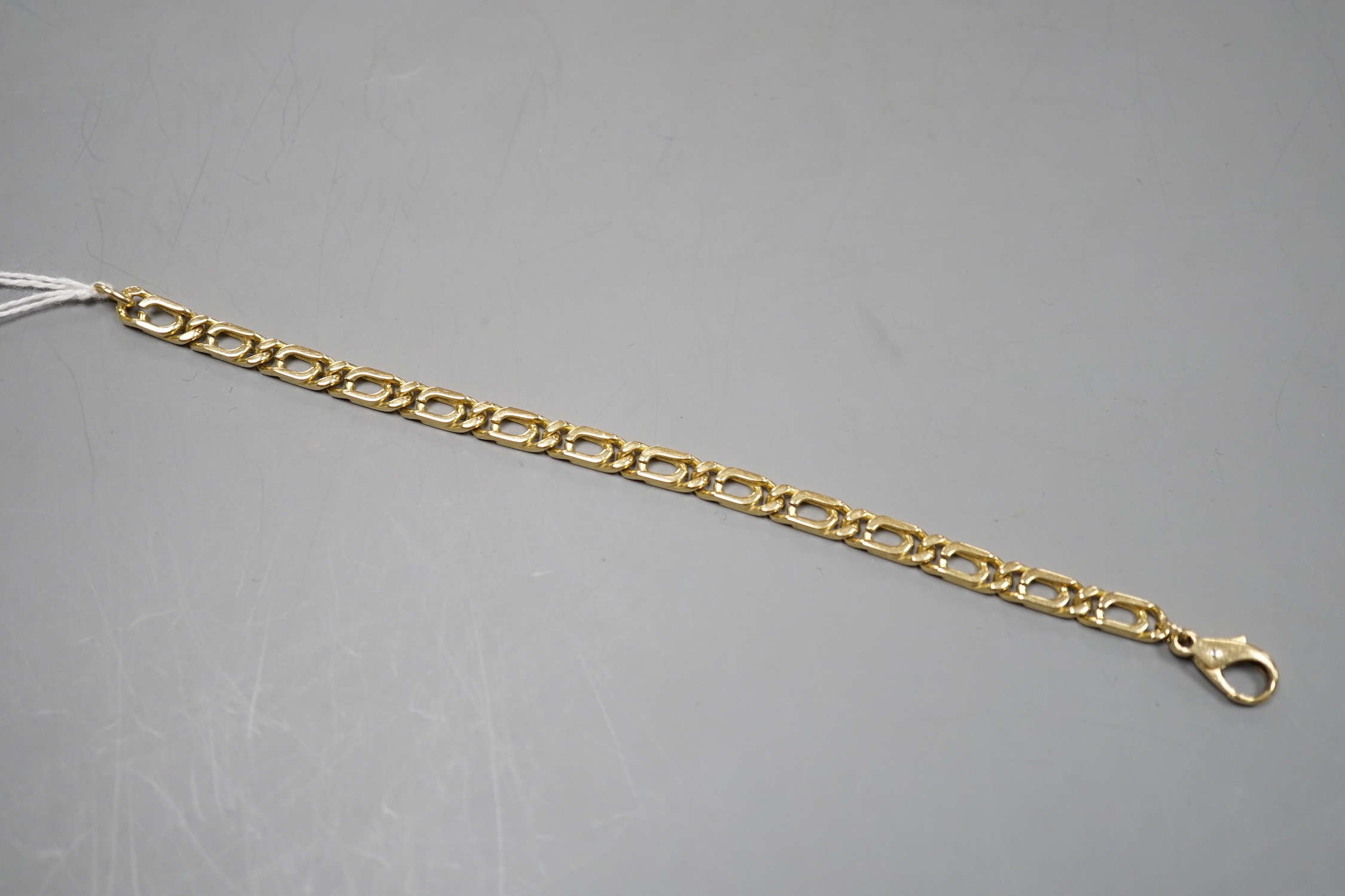 A modern 750 yellow metal rectangular link bracelet, 18cm, 18 grams.